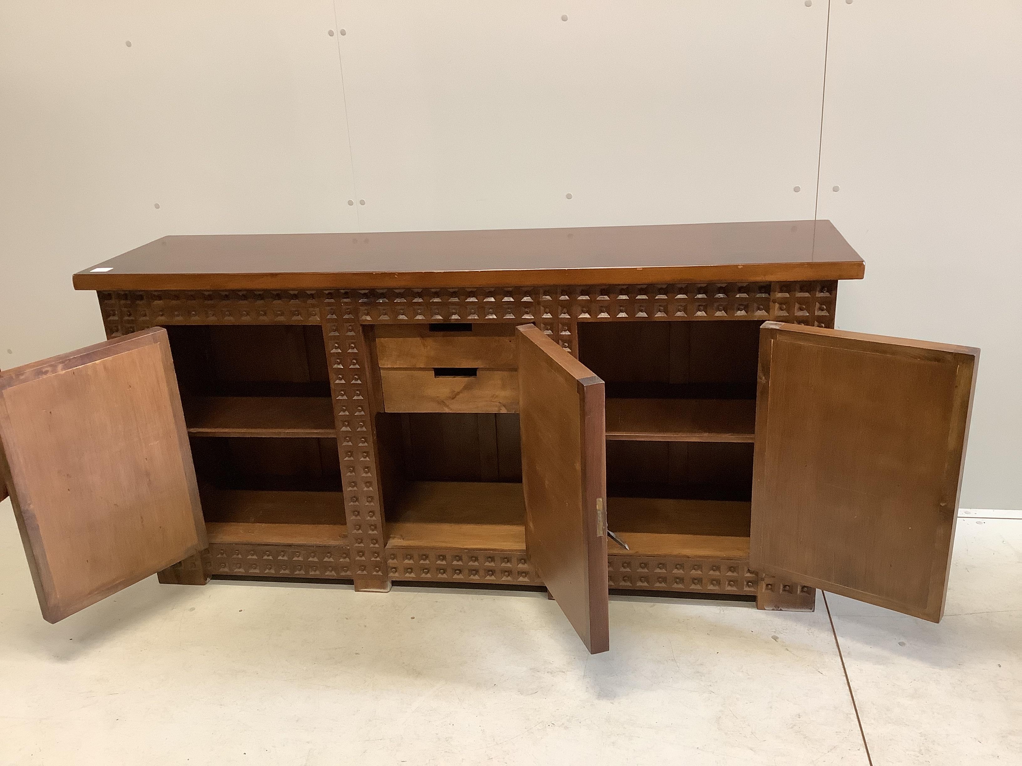 A Spanish walnut and fruitwood sideboard, width 172cm, depth 43cm, height 84cm